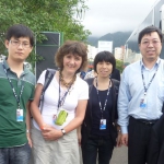 Huang Haoming (à droite) et ses collègues de Cango avec Antoinette Brouyaux